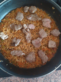 Una foto de Arroz seco de costillar ibérico con filete de aguja