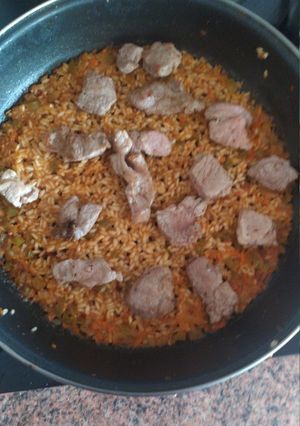 Una foto de Arroz seco de costillar ibérico con filete de aguja