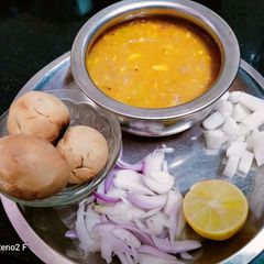 A picture of Dal bati churma.