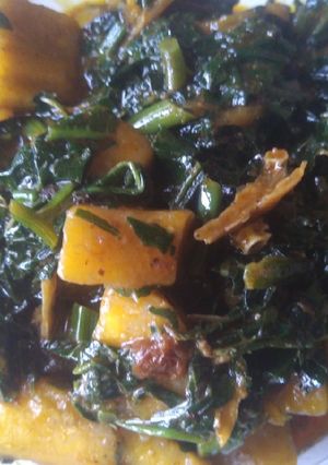 A picture of Unripe plantain porridge and Vegetable.