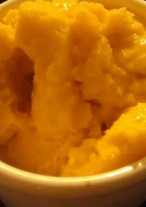 Una foto de Helado de mango con manzanas