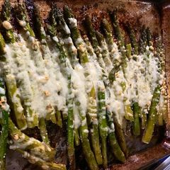 A picture of Roasted Asparagus with Mozzarella cheese: Keto approves.