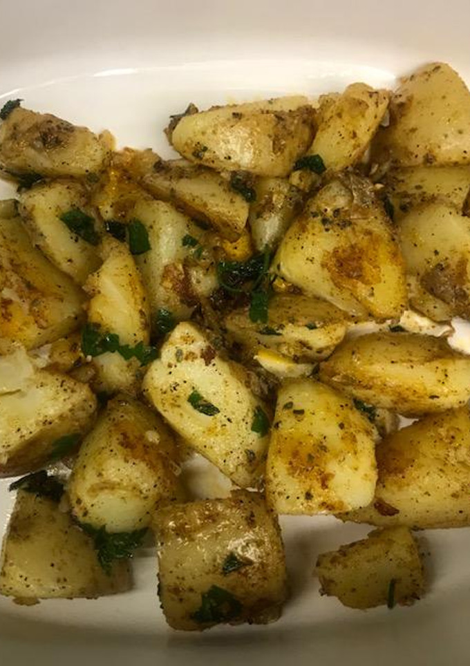 Una foto de Papas salteadas en mantequilla
