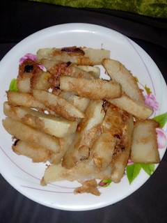A picture of Fried yam with egg.