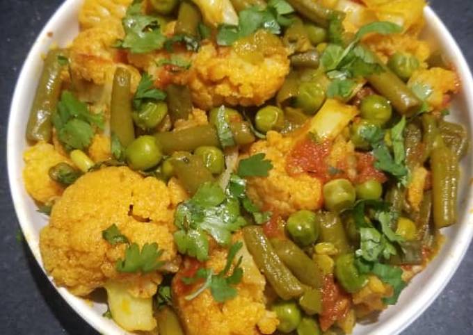 Cauliflower French Beans and Green Peas Curry Recipe by Foram C. Virani ...