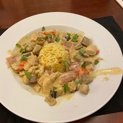 A picture of Green Curry Chicken and Eggplant.
