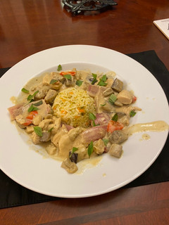 A picture of Green Curry Chicken and Eggplant.