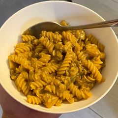 A picture of White fish pan-fried pasta.