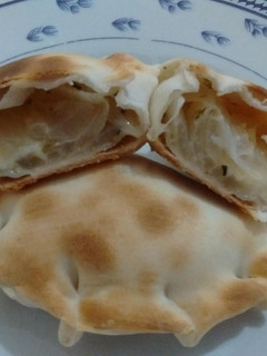 Una foto de Empanadas de cebolla y queso azul