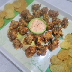 A picture of Corn spinach fritters.