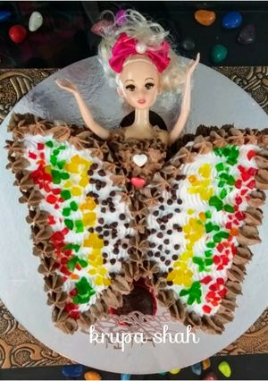A picture of Butterfly doll cake.