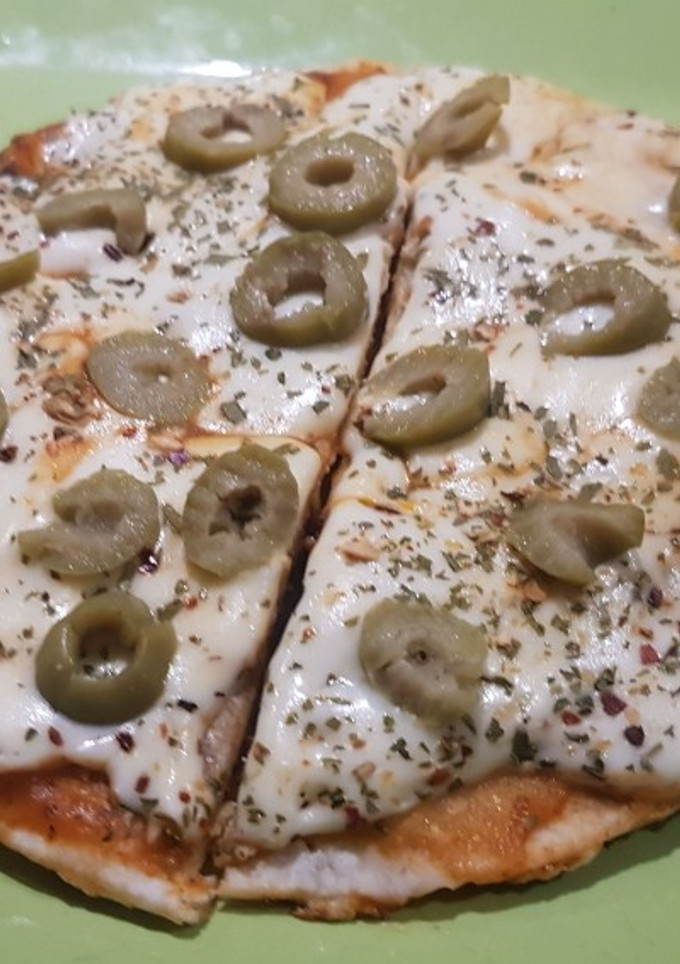 Una foto de Pizza rellena TACOPIZZA (con tortillas para tacos)