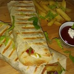 A picture of Turkish Chicken Shawarma With Fries.