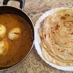 A picture of Home made Porotta (Kerala Paratha).