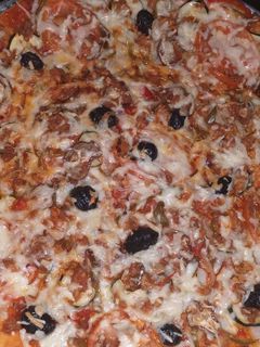 Una foto de Pizza vegetal