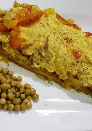 Una foto de Filet de merluza al curry!.