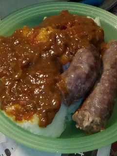 A picture of Pap, gravy and boerewors.