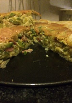 Una foto de Soufle de zapallito con masa y panchos