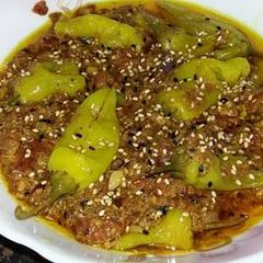 Achari hari mirch ka salan A picture of Achari hari mirch ka salan.