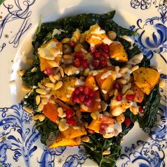 A picture of Roasted squash and chickpeas with tahini sauce - vegan.