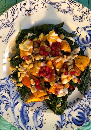 A picture of Roasted squash and chickpeas with tahini sauce - vegan.