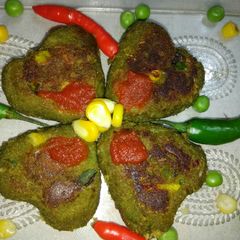 A picture of Paneer stuffed green heart.
