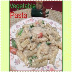 A picture of Vegetable Pasta in white sauce.