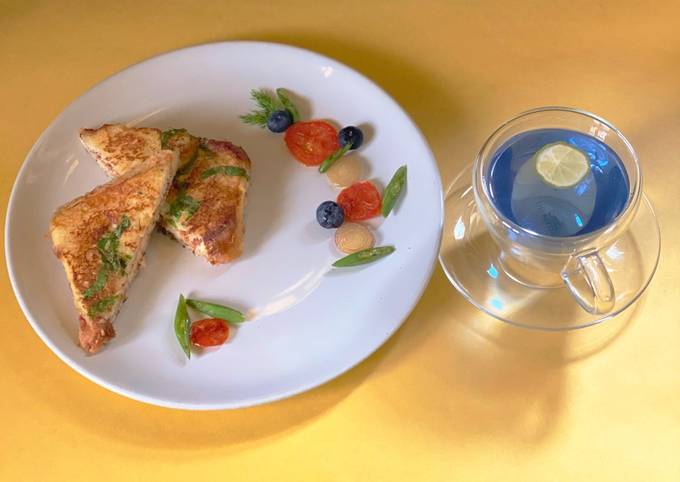 Cheesy French Toast With Butterfly Pea Lemon Tea Recipe By Madhumita Bishnu Cookpad