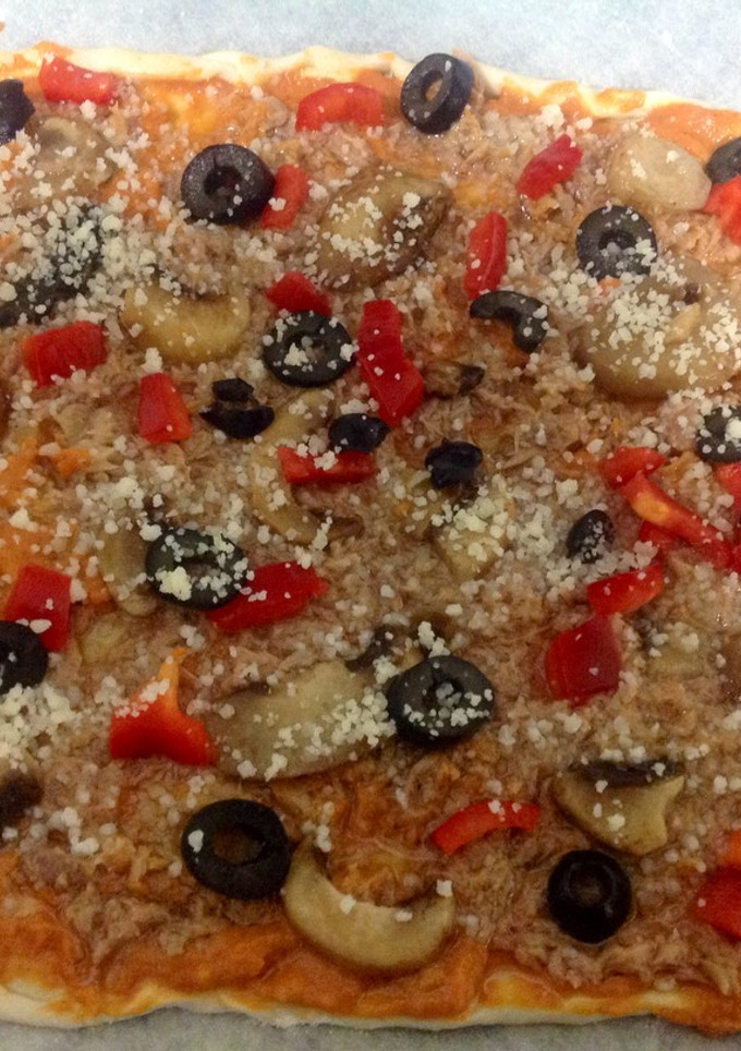 Una foto de Pizza sin gluten con atún a tu gusto