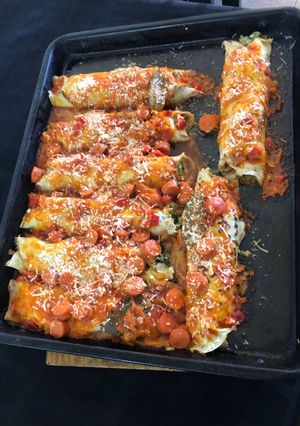 Una foto de Canelones de verdura y ricota con tuco