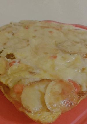 Una foto de Tortilla de papas gratinada