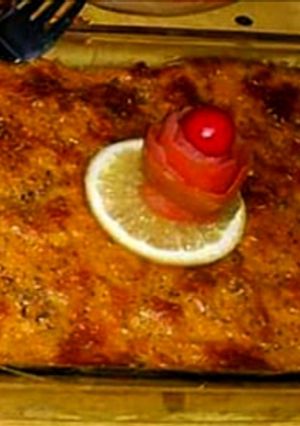 A picture of Baked chicken cheese pasta with orange sauce.
