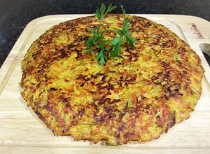 Una foto de Tortilla de zanahorias y calabacín a la cinco pimienta para llevar a la playa