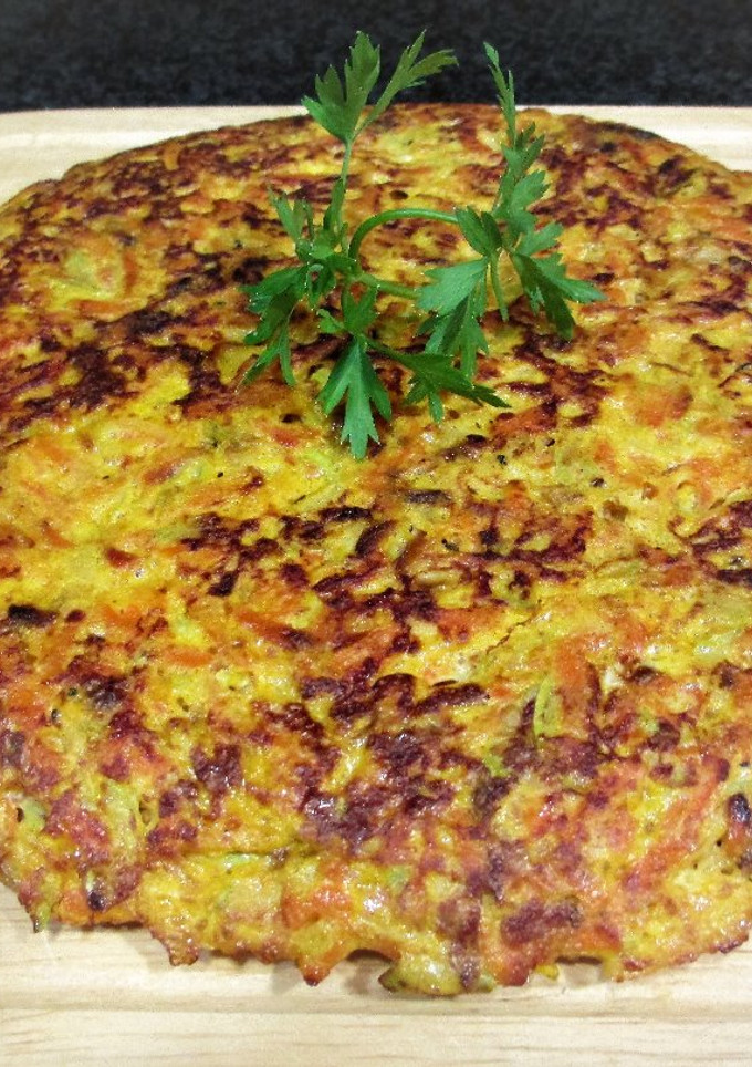 Una foto de Tortilla de zanahorias y calabacín a la cinco pimienta para llevar a la playa