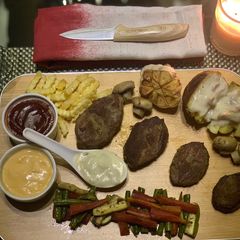 A picture of Fillet mignon with mushroom sauce.