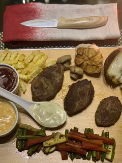A picture of Fillet mignon with mushroom sauce.