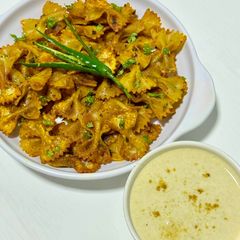 Air Fryer Masala Farfalle Chips with Cumin Yogurt Dip A picture of Air Fryer Masala Farfalle Chips with Cumin Yogurt Dip.