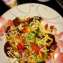 A picture of Sweet corn tikki chaat.