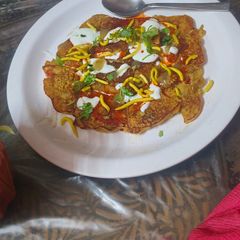 A picture of Crispy besan chilla chaat.