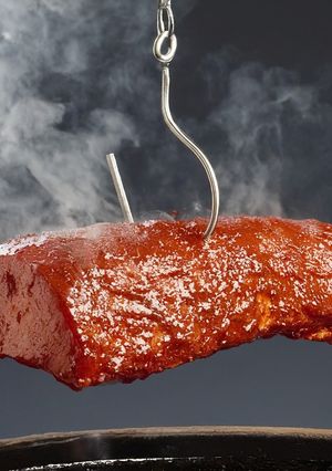 Una foto de Bondiola en salsa BBQ