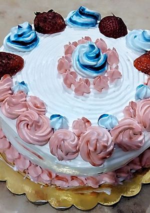 A picture of Eggless Wheat Butterscotch cake with whipped cream.