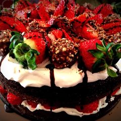 A picture of Ferrero Rocher Strawberry Chocolate cake .
