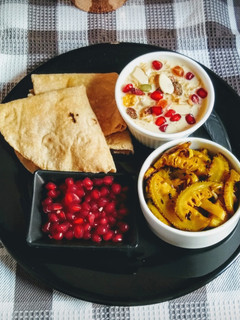 A picture of Muesli, Vermicelli Kheer, Kantola Aloo Fry And Roti.