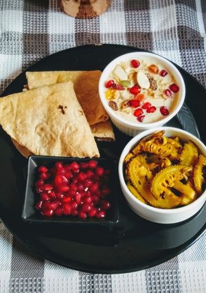 A picture of Muesli, Vermicelli Kheer, Kantola Aloo Fry And Roti.