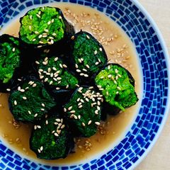 A picture of Spinach Nori Rolls in Miso Sesame sauce.