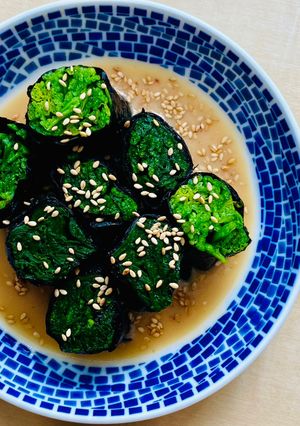 A picture of Spinach Nori Rolls in Miso Sesame sauce.
