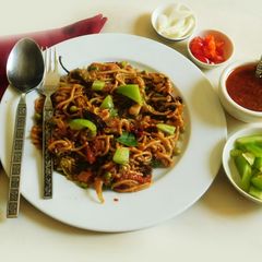 A picture of Aromatic, spicy, hot,  Protein rich noodles cooked in Indo American Chinese style.