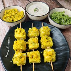A picture of Coconut corn masala bite with three coconut dips.