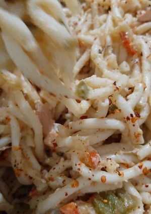 A picture of Creamy white sauce pasta.
