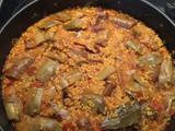 Arroz meloso con alcachofas y conserva de cerdo
